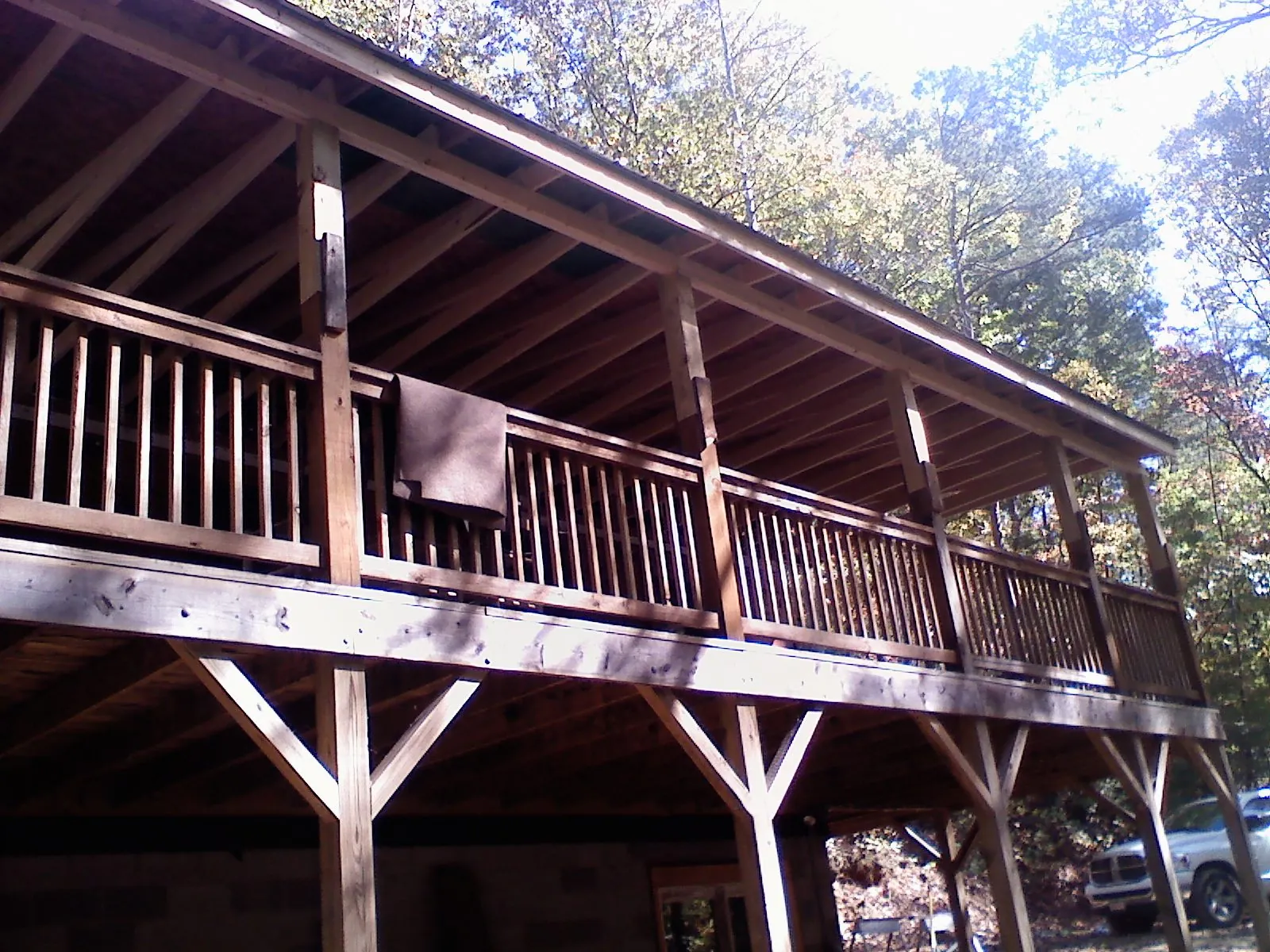 Timber framing under a new elevated porch and deck — Roof Leak Repair in Chelmsford by Roofing Brothers